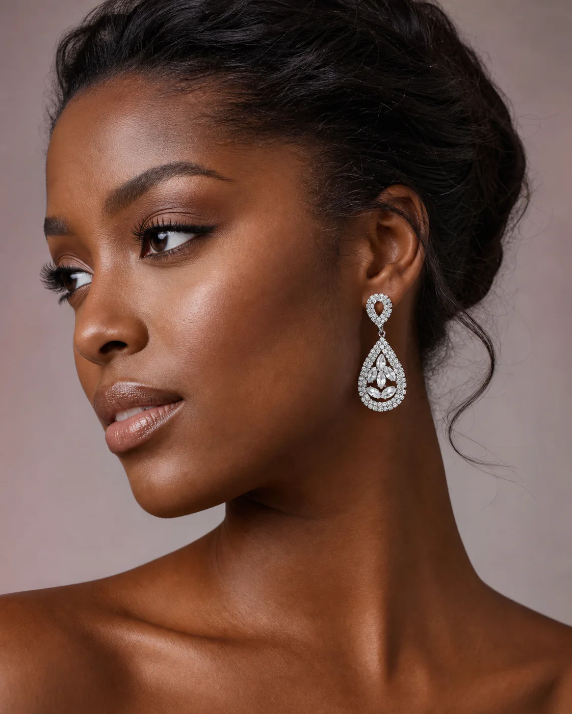 Editorial model styling with clear crystal teardrop earrings