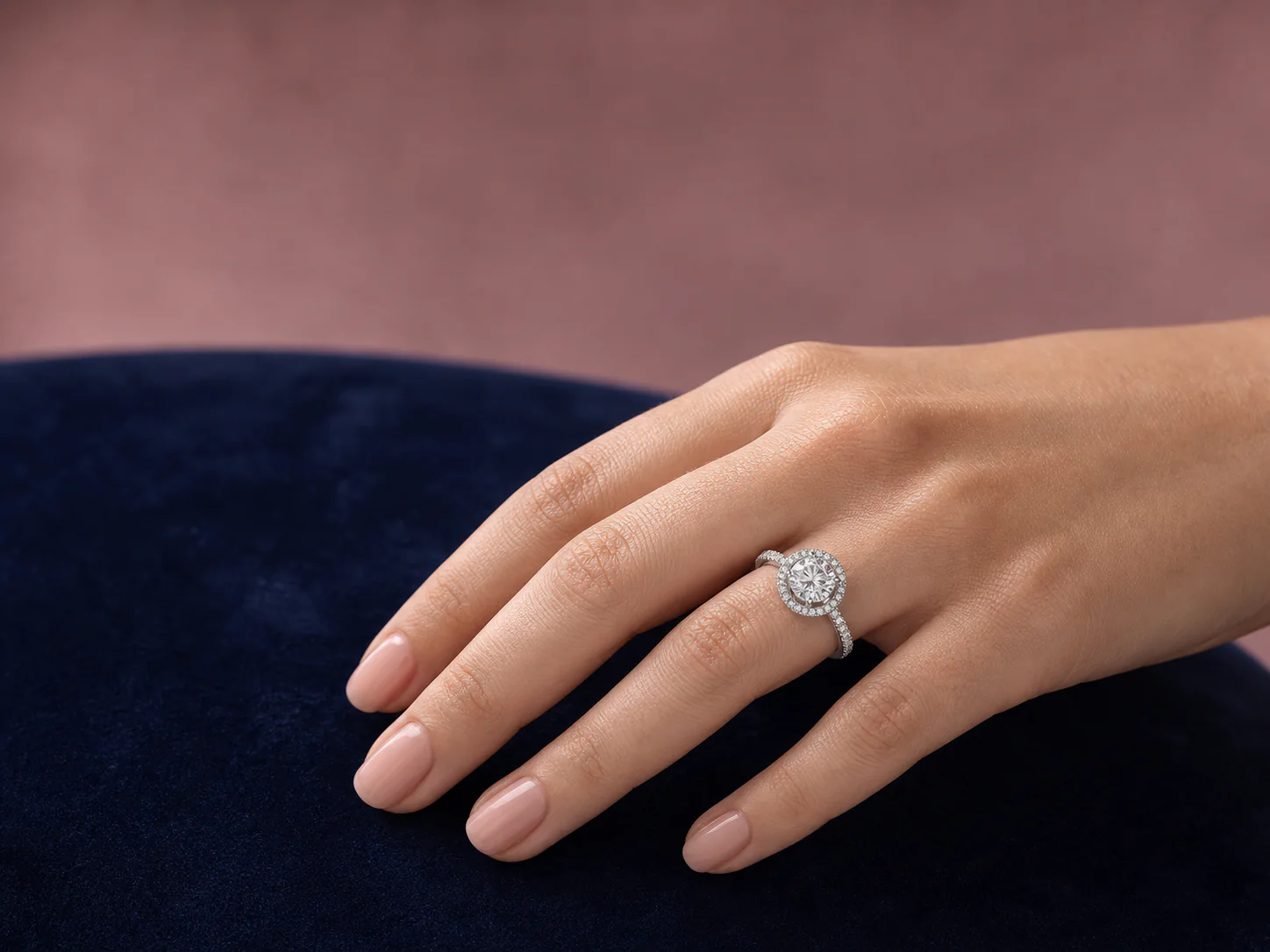 Editorial hand styling with a clear crystal halo ring