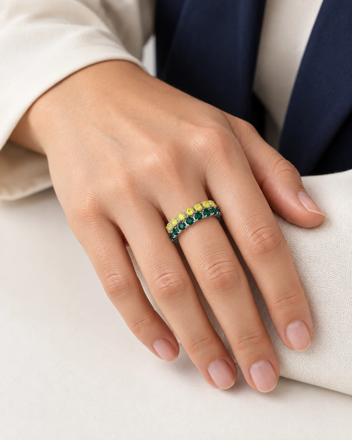 AI styling image of a green and yellow two-row ring on an adult hand