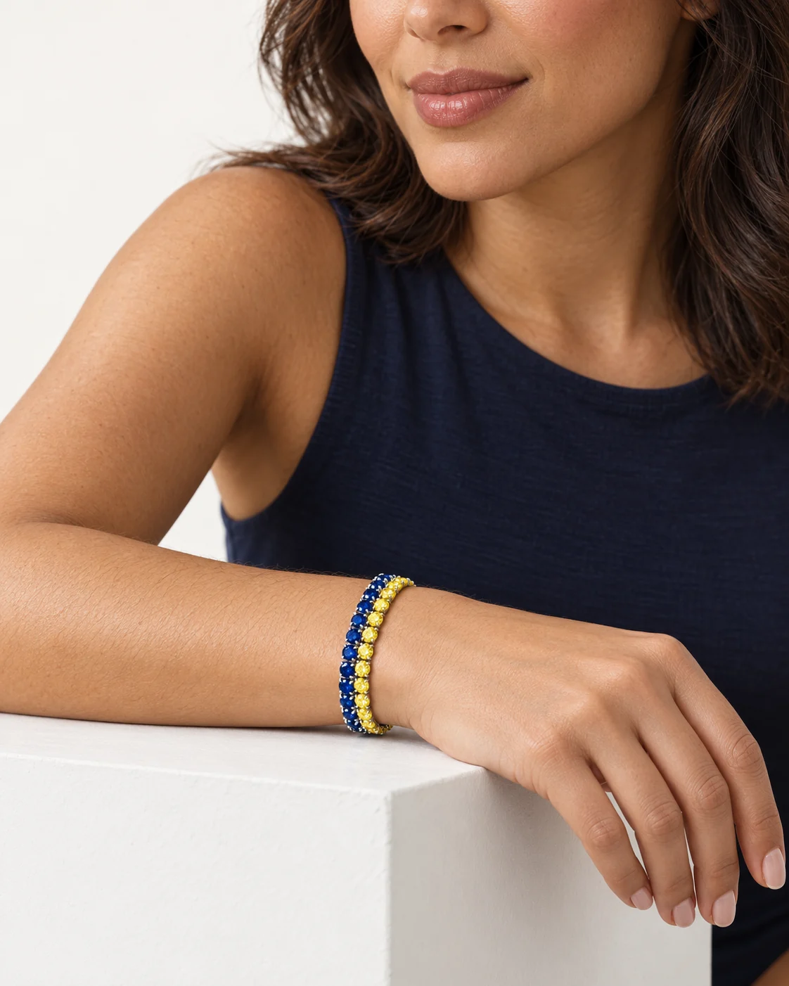 AI styling image of a blue and yellow two-row bracelet on an adult wrist